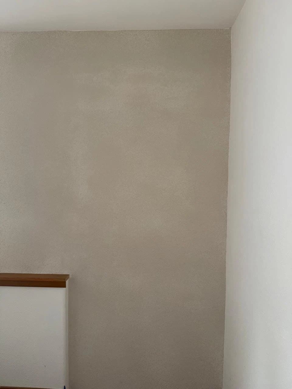 Wall where the doorway used to be, textured to match