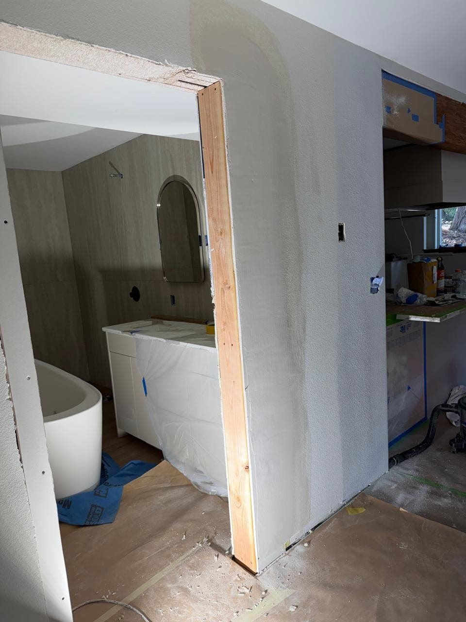 Damaged door corner with bare framing